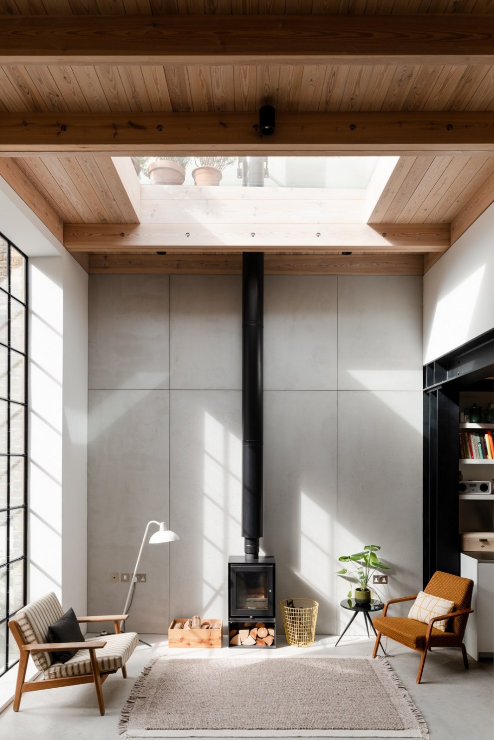 Gin Distillery | Double height living space with oversized crittall window | Interior Designers